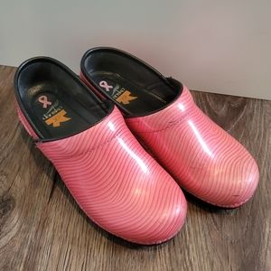 Pink Dansko clogs